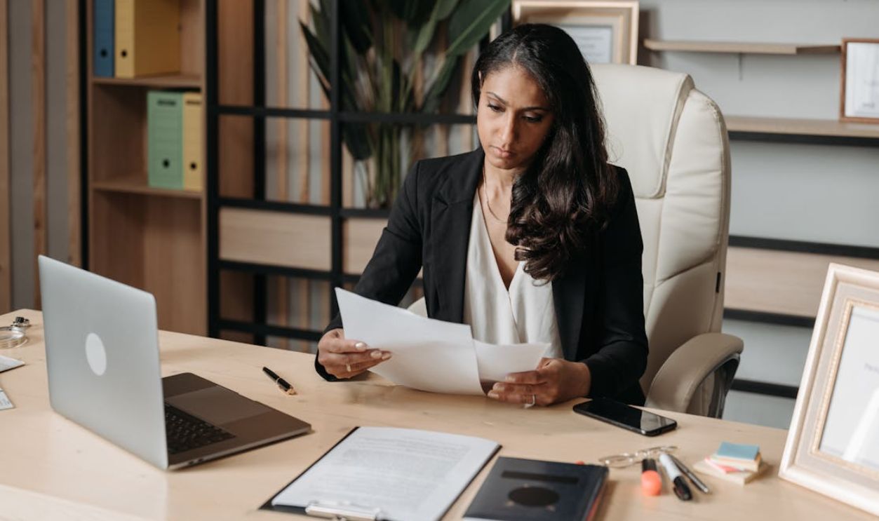 Woman Working at the Desk in Office