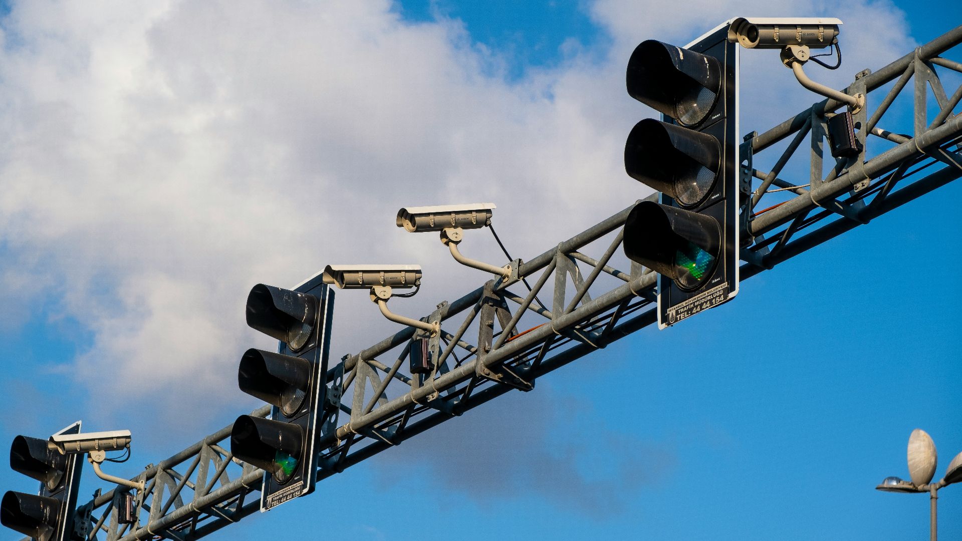 traffic light under blue sky during daytime