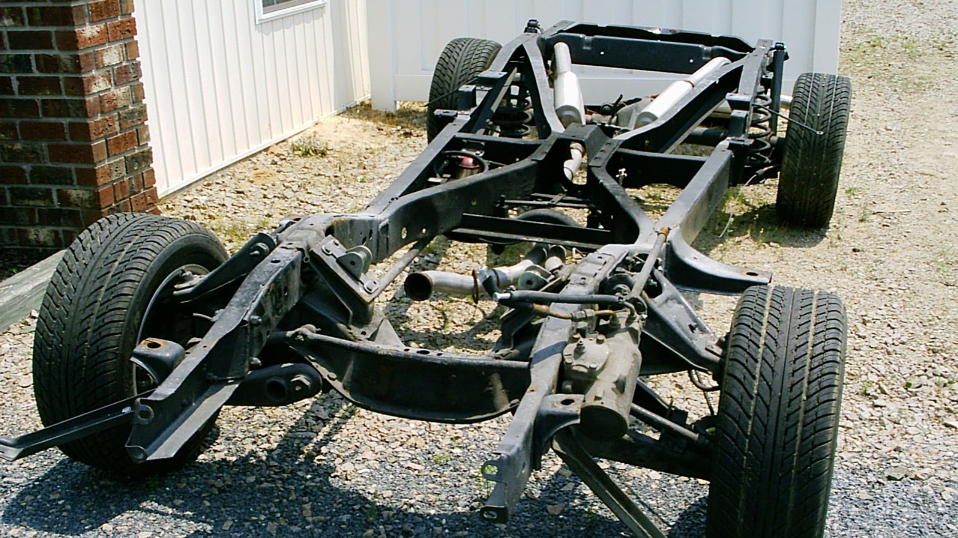File:Chassis with suspension and exhaust system.jpg