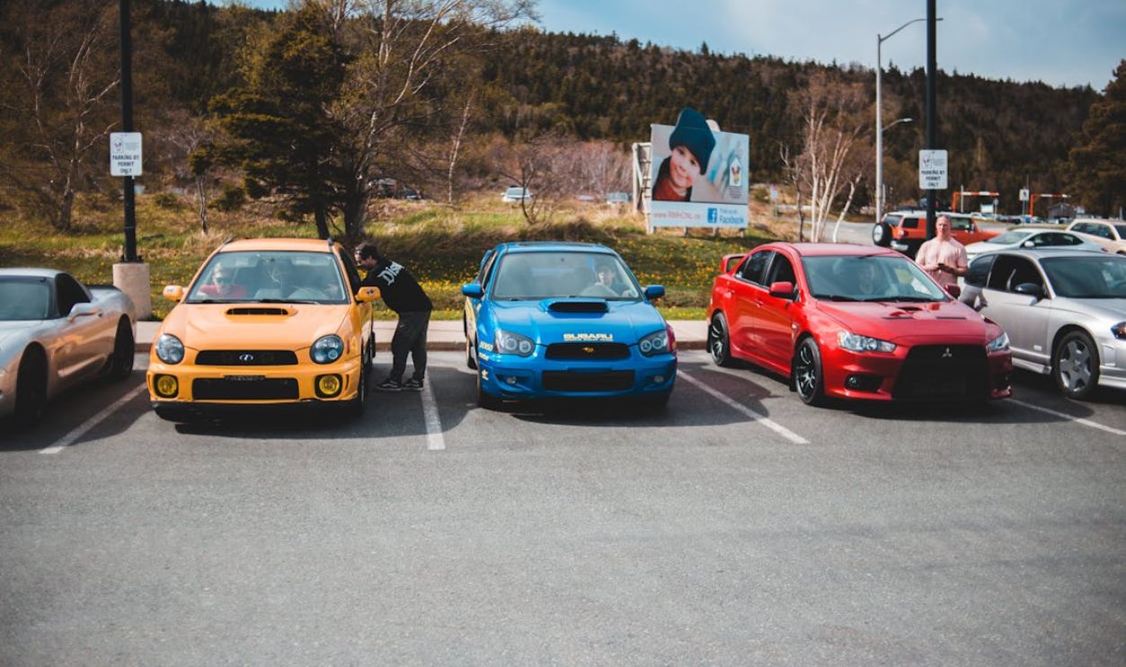 Photo of Cars Parked on Parking Space