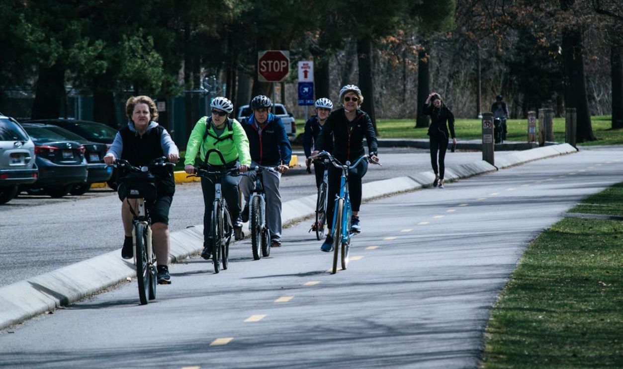 Five Person Riding Bikes