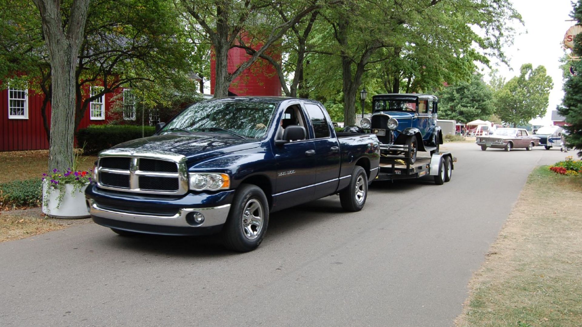 File:Dodge Ram Pickup pulling Model A Ford (1143637965).jpg