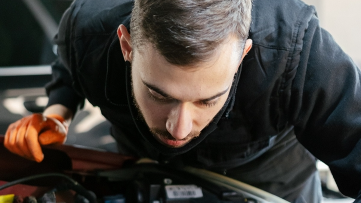 Car mechanic working on a vehicle