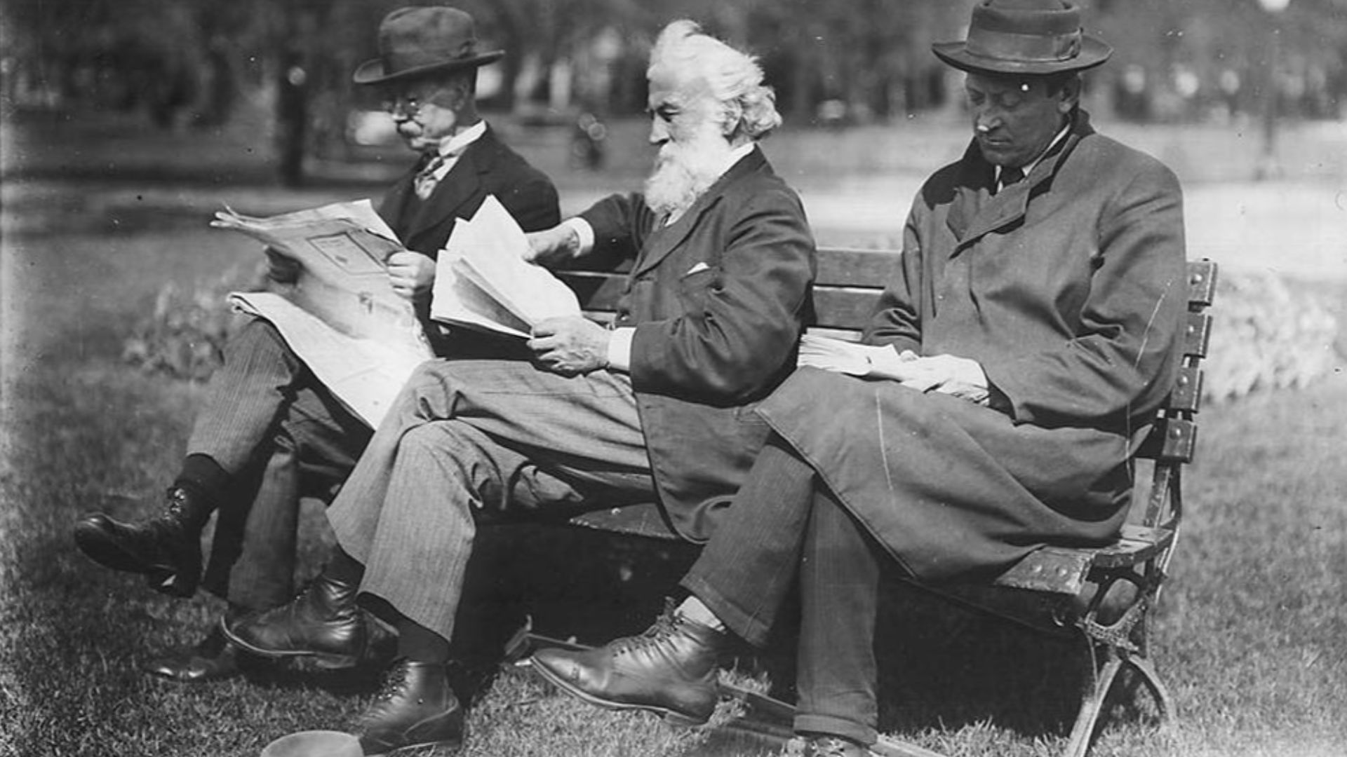 File:Three men on a bench.jpg