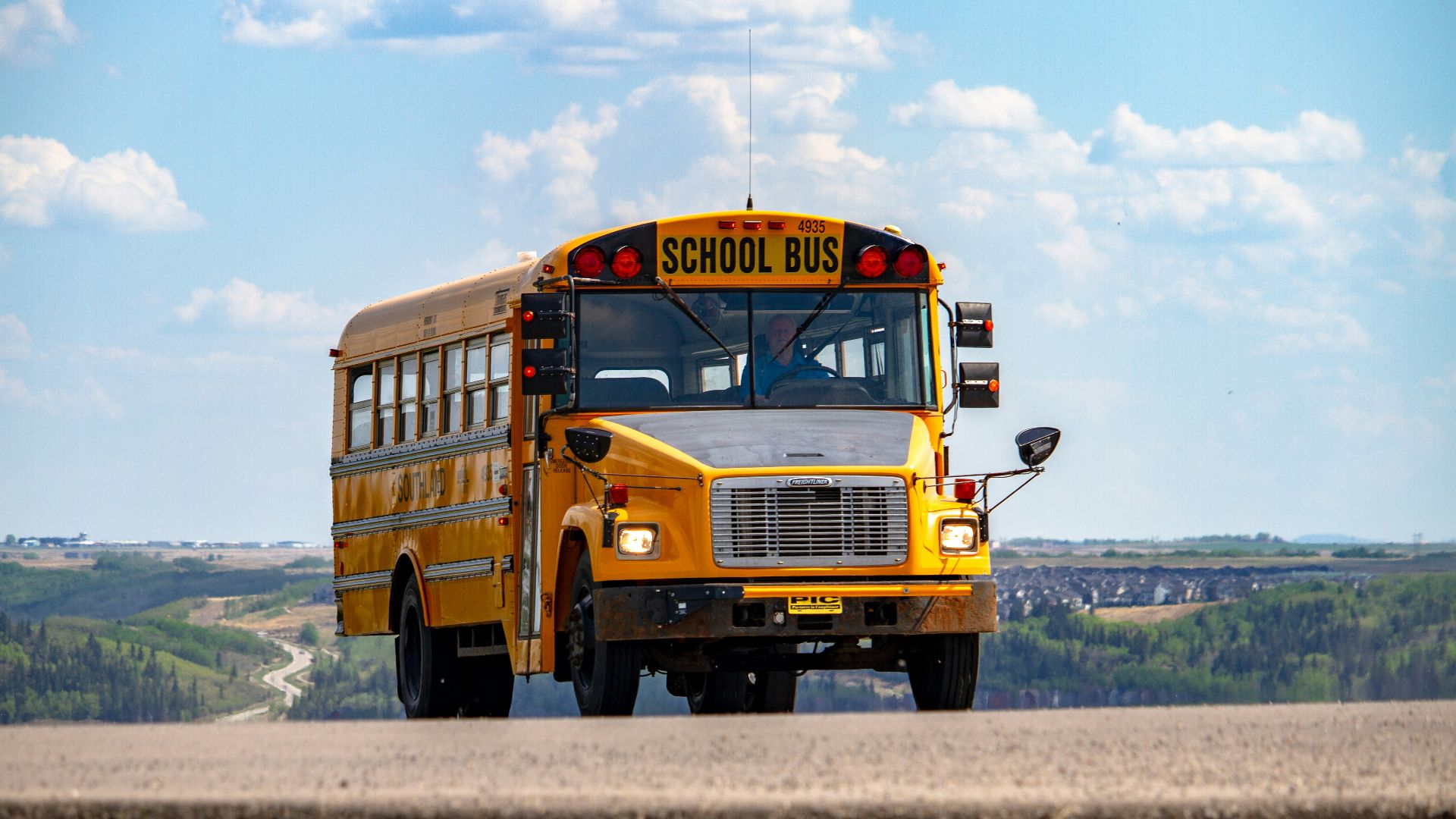 school bus on pathway