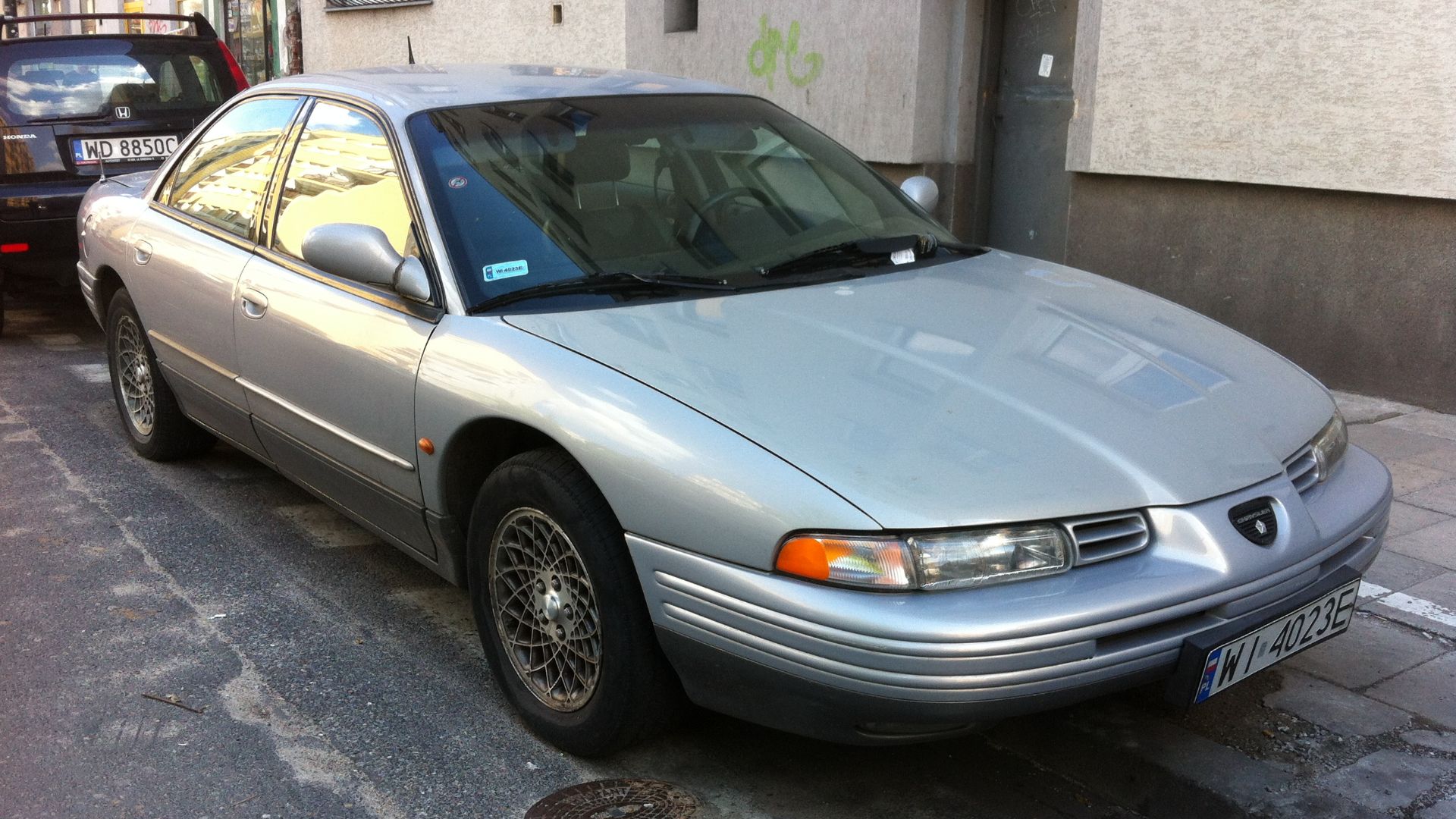 Chrysler Vision (export version of the Eagle Vision) silver sedan, front right view. Photographed on Solec Street (near Tamka) in Warsaw, Poland