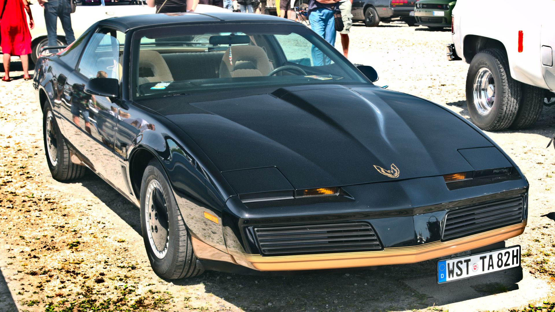 File:1982 Pontiac Firebird TransAm with remote-controlled toy car.jpg