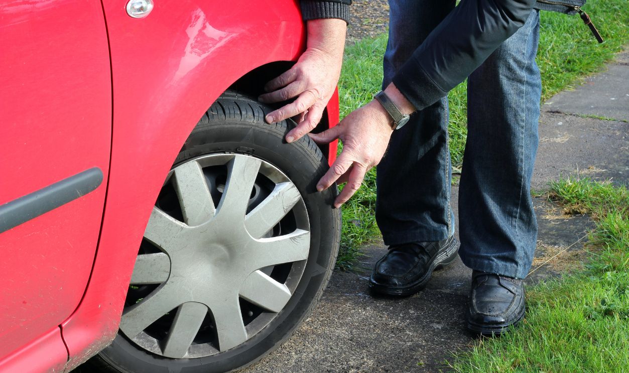 checking depth of tread on a vehicle tyre or tire.