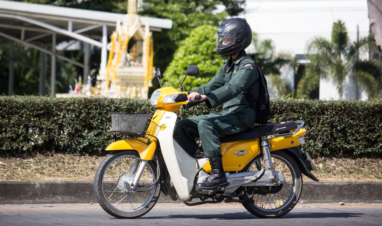 Chiangmai, Thailand - December 6 2019: Private Honda Super Cub Motorcycle. On road no.1001, 8 km from Chiangmai Business Area.