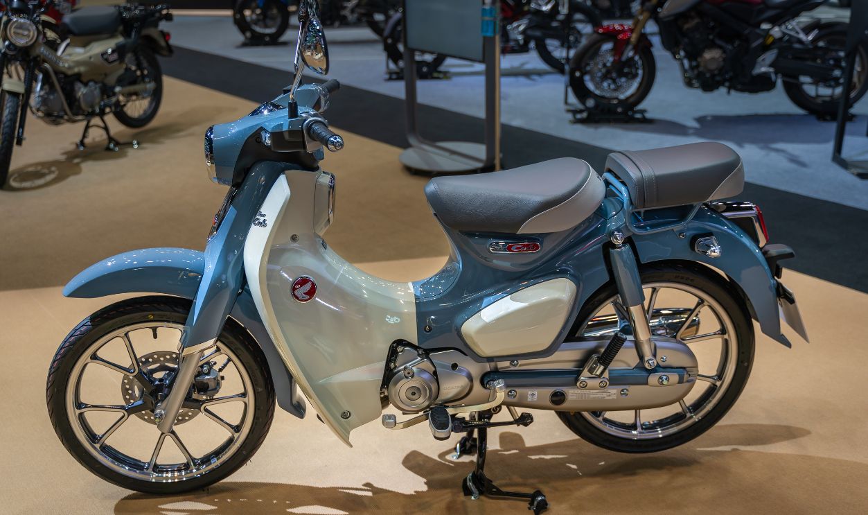 Bangkok, Thailand - 24 March 2021 : Honda Super Cub C 125 Motorcycle classic collection on display at display in 42th Bangkok International Motor Show 2021 . Concept retro style.