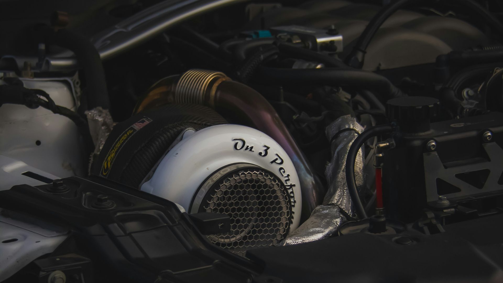 A close up of the engine of a car