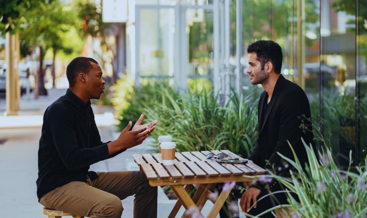 Male Colleagues talking to each other