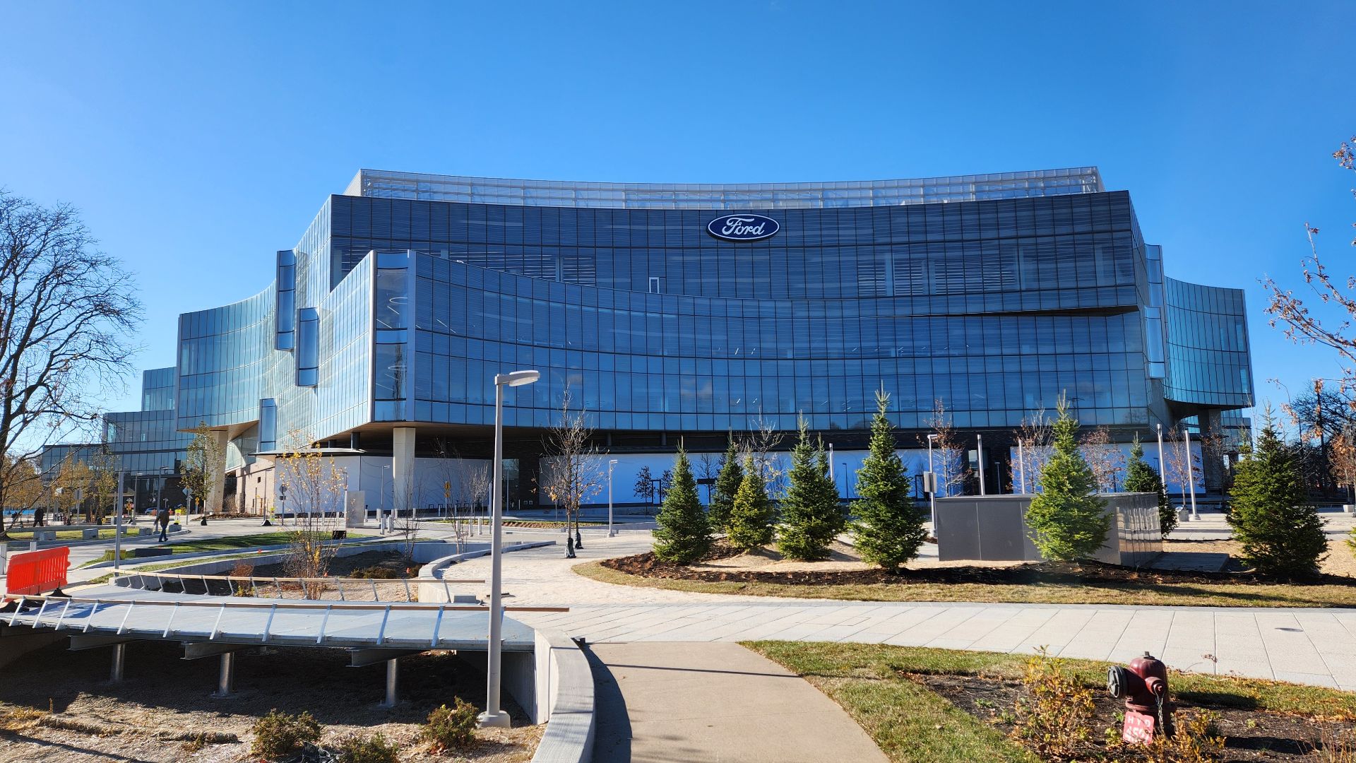 File:Ford World Headquarters from sidewalk, against sun.jpg