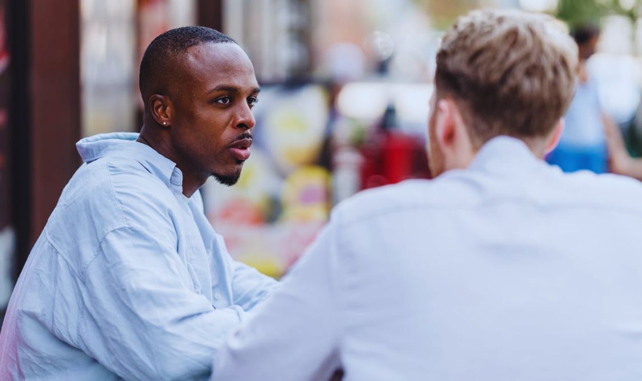 Men in Shirts Sitting