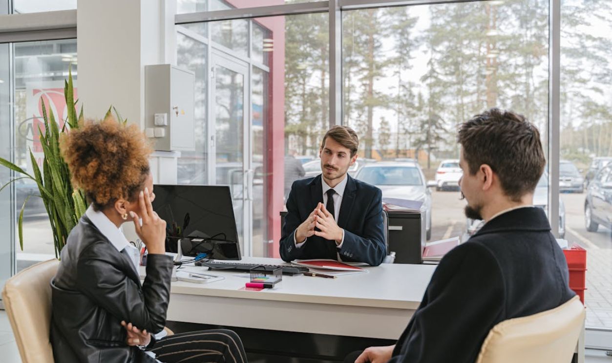 People Sitting in Office Talking
