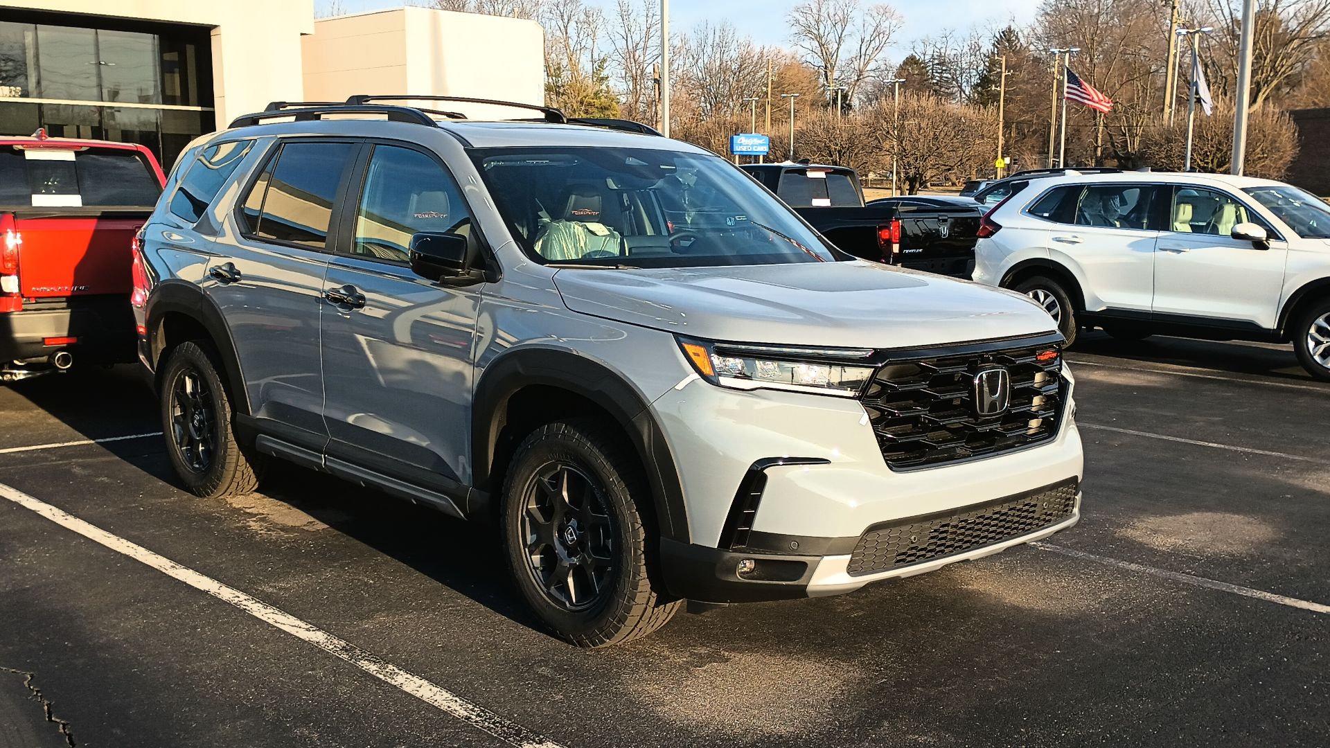 Front view of a 2023 Honda Pilot TrailSport AWD SUV.