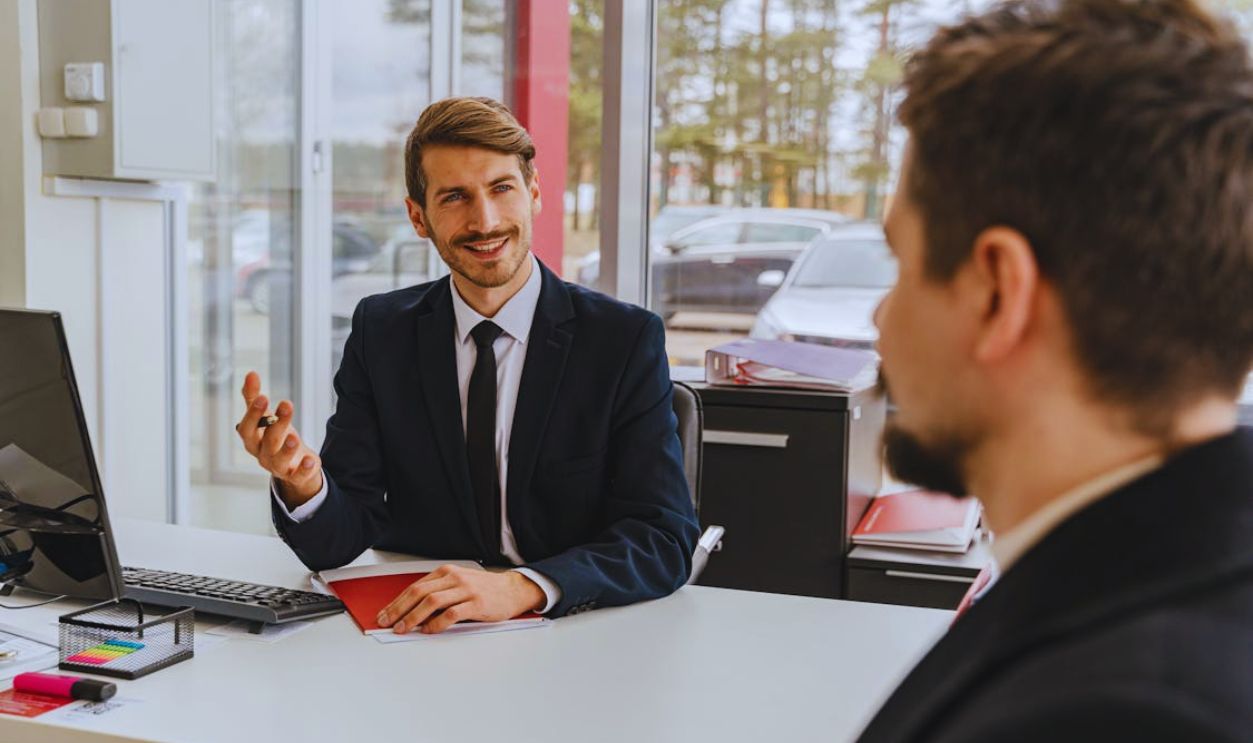 Businessman Talking with Client