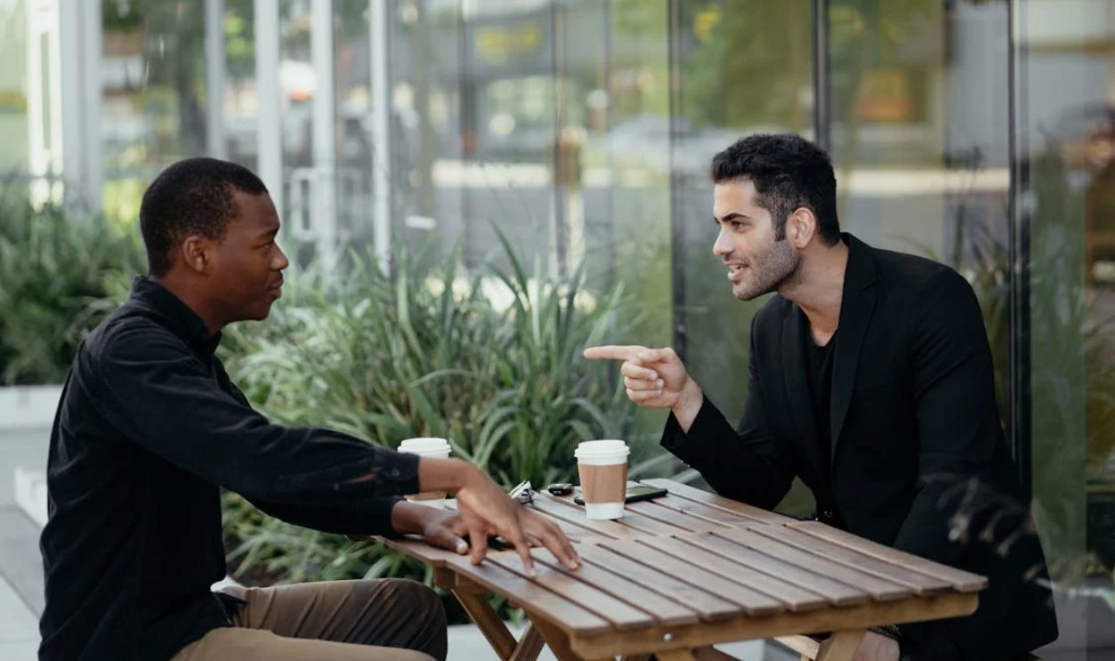 Two Men Having a Conversation