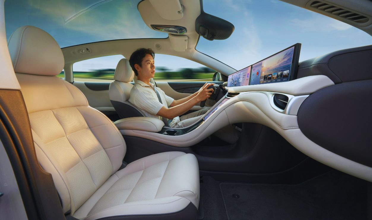 Modern Electric Car Interior with Driver on Open Road