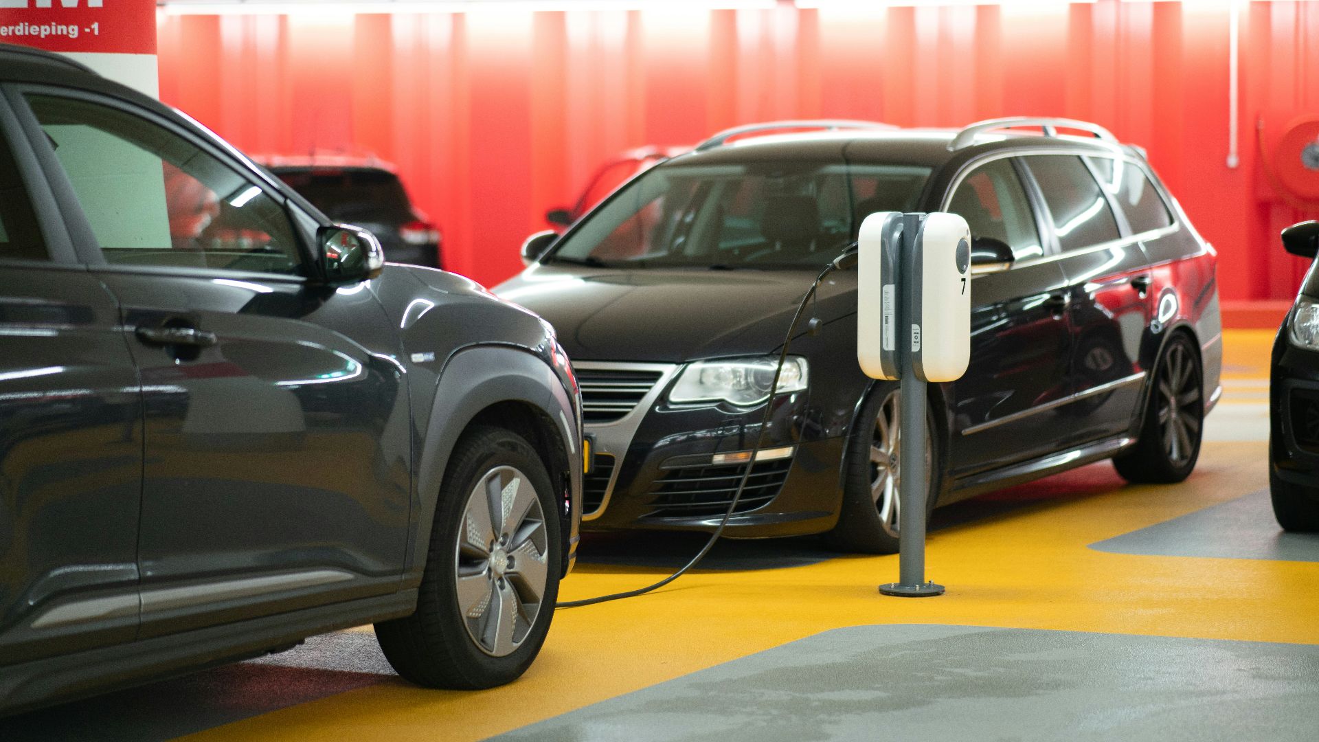 black sedan on road during daytime