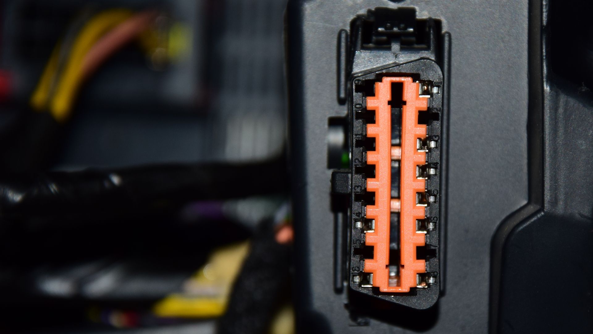 Female OBD-II connector on a car (Peugeot 208).