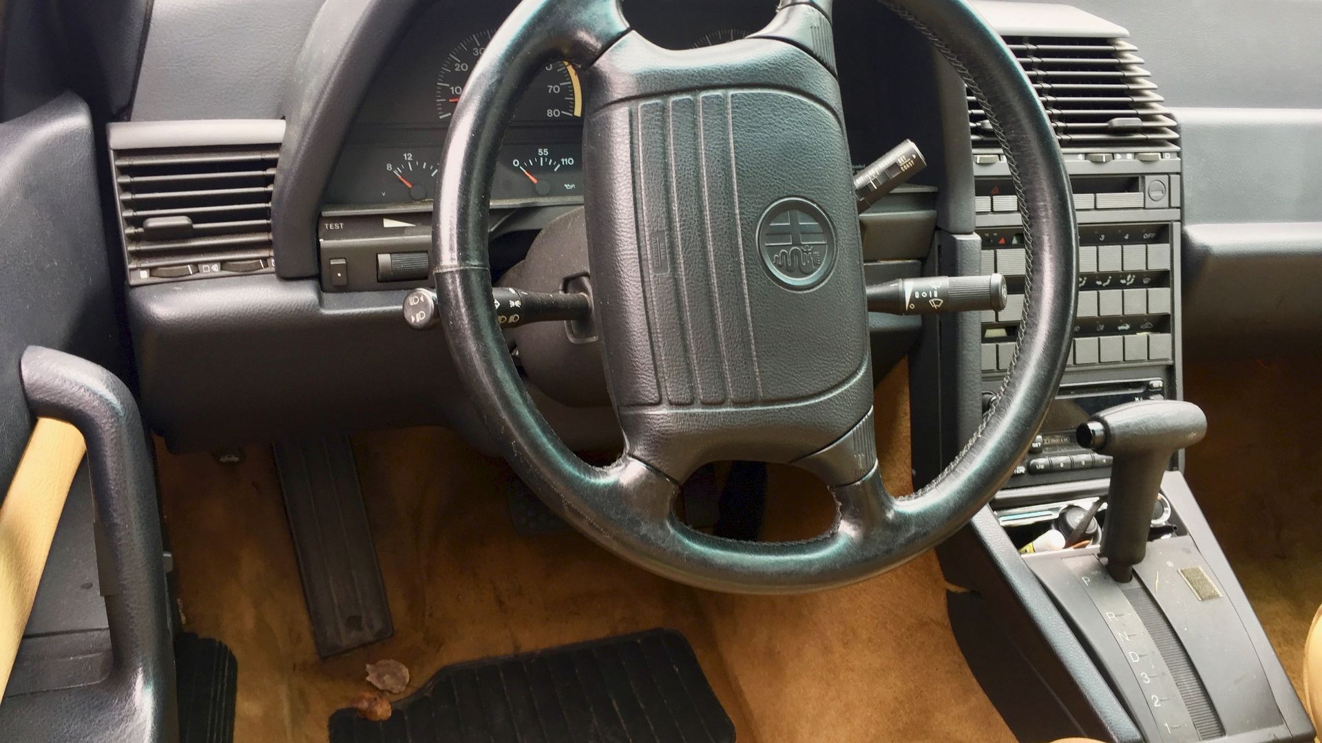 1991 Alfa Romeo 164 L sedan finished in dark green. These photographs were taken at the 2017 Antique and Classic car show in Rockville, Maryland.