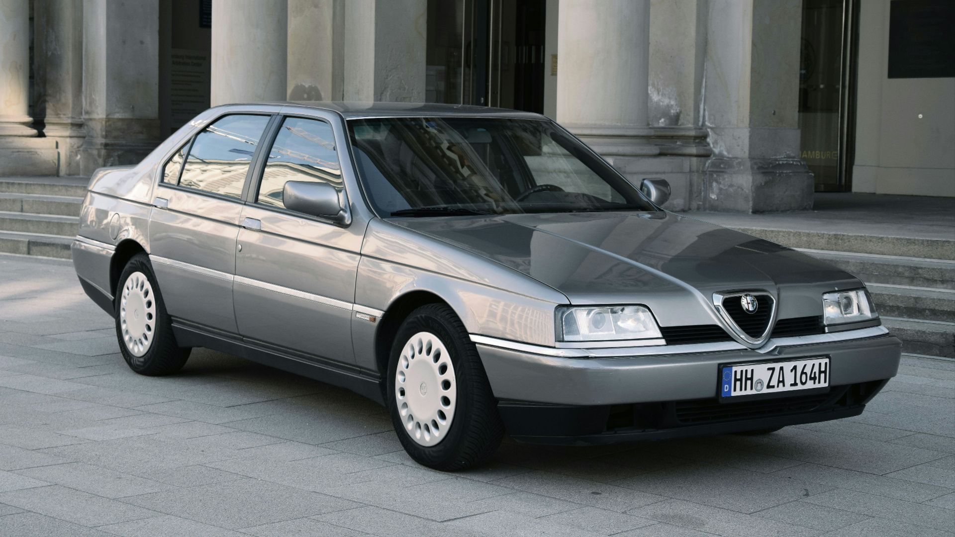 My 1994 Alfa Romeo 164 Super 2.0 TS. An anything but perfect yet fun to drive and nice to look at modern classic. Pictured in Hamburg, Germany, in front of the Handelskammer (chamber of commerce) building.