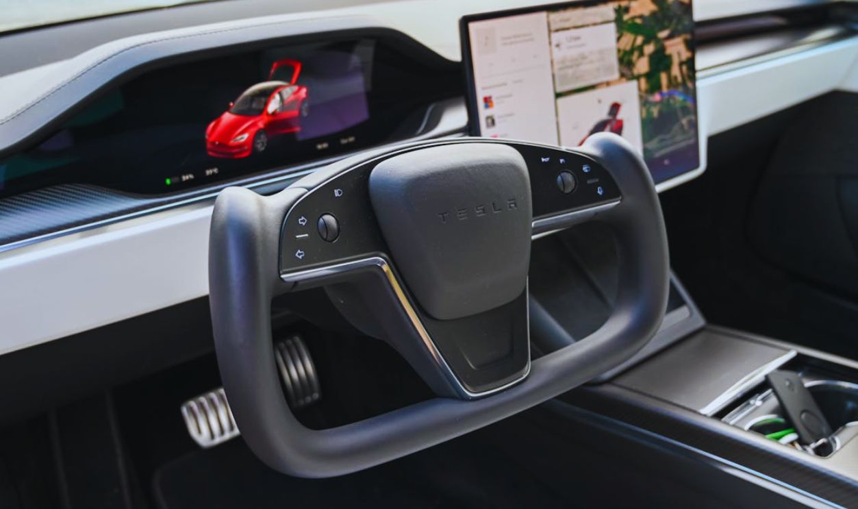 Steering Wheel and Screens in Tesla Car Interior