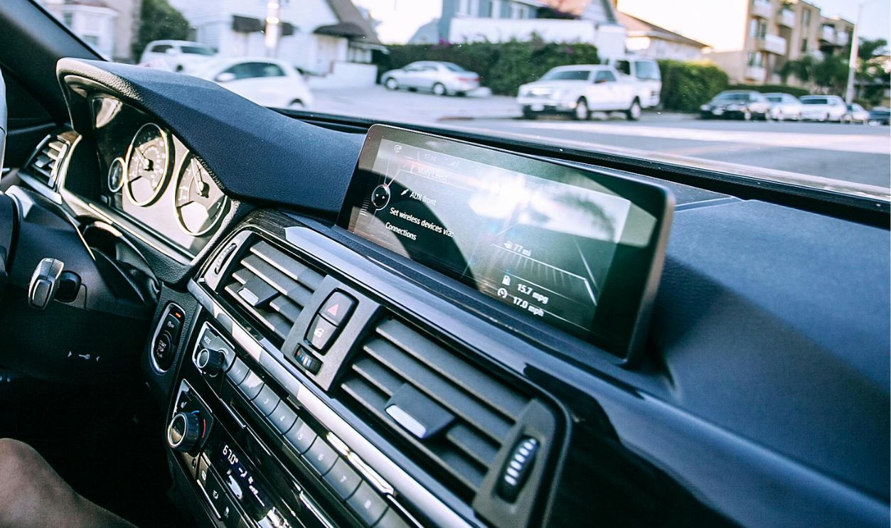 Anonymous woman driving car in town