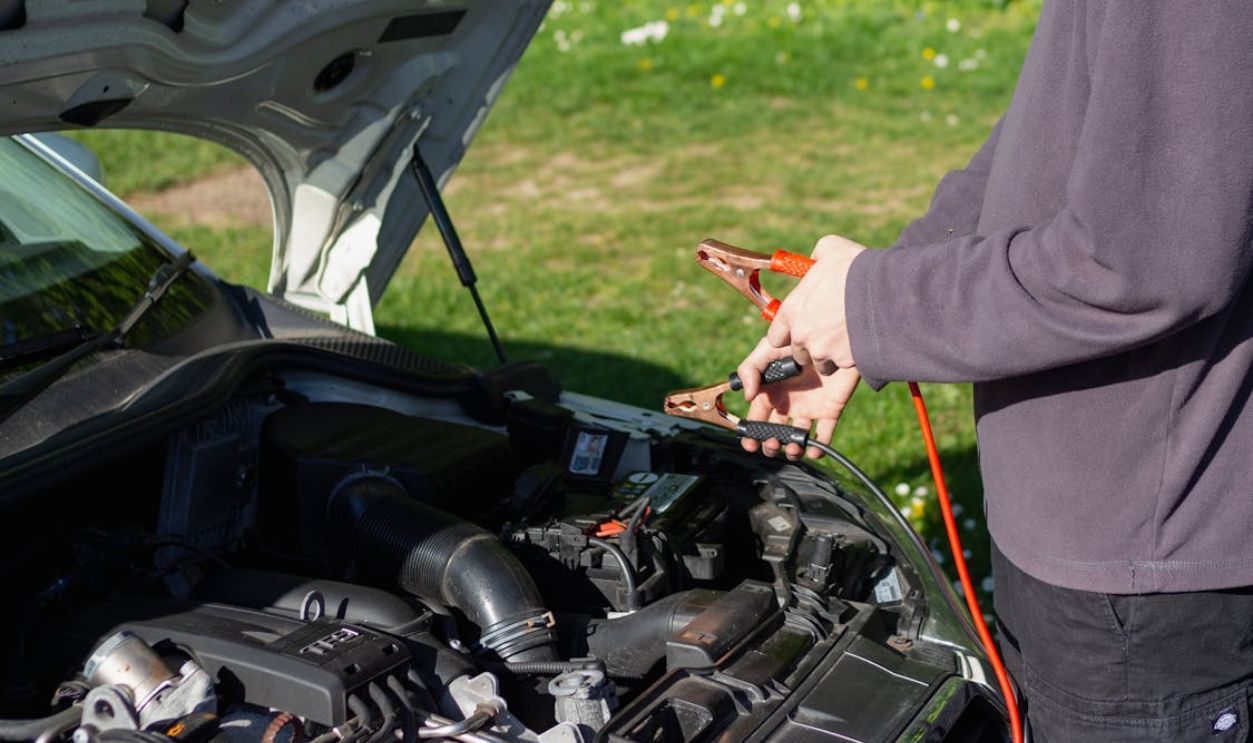 Close-up of Man Repairing Car