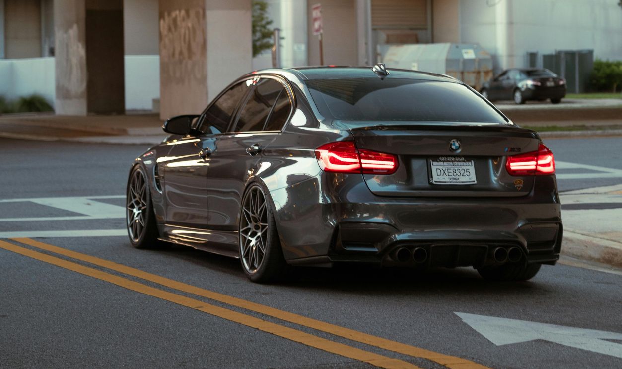 Sleek Luxury Car on Urban Street at Dusk