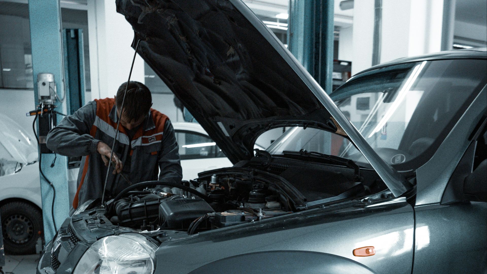 black suv in a garage
