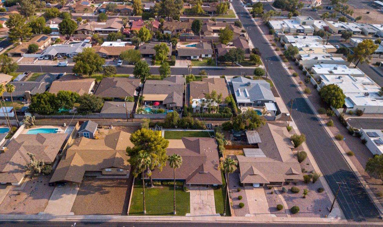 An Aerial Shot of Houses in a Neighborhood