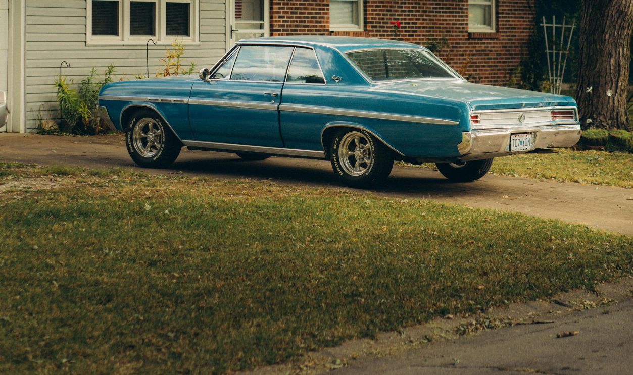 A Car Parked on a Driveway