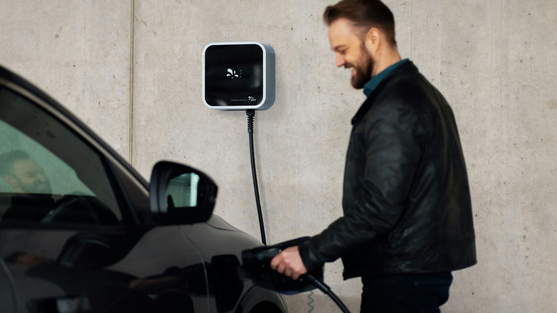 A man is pumping gas into his car