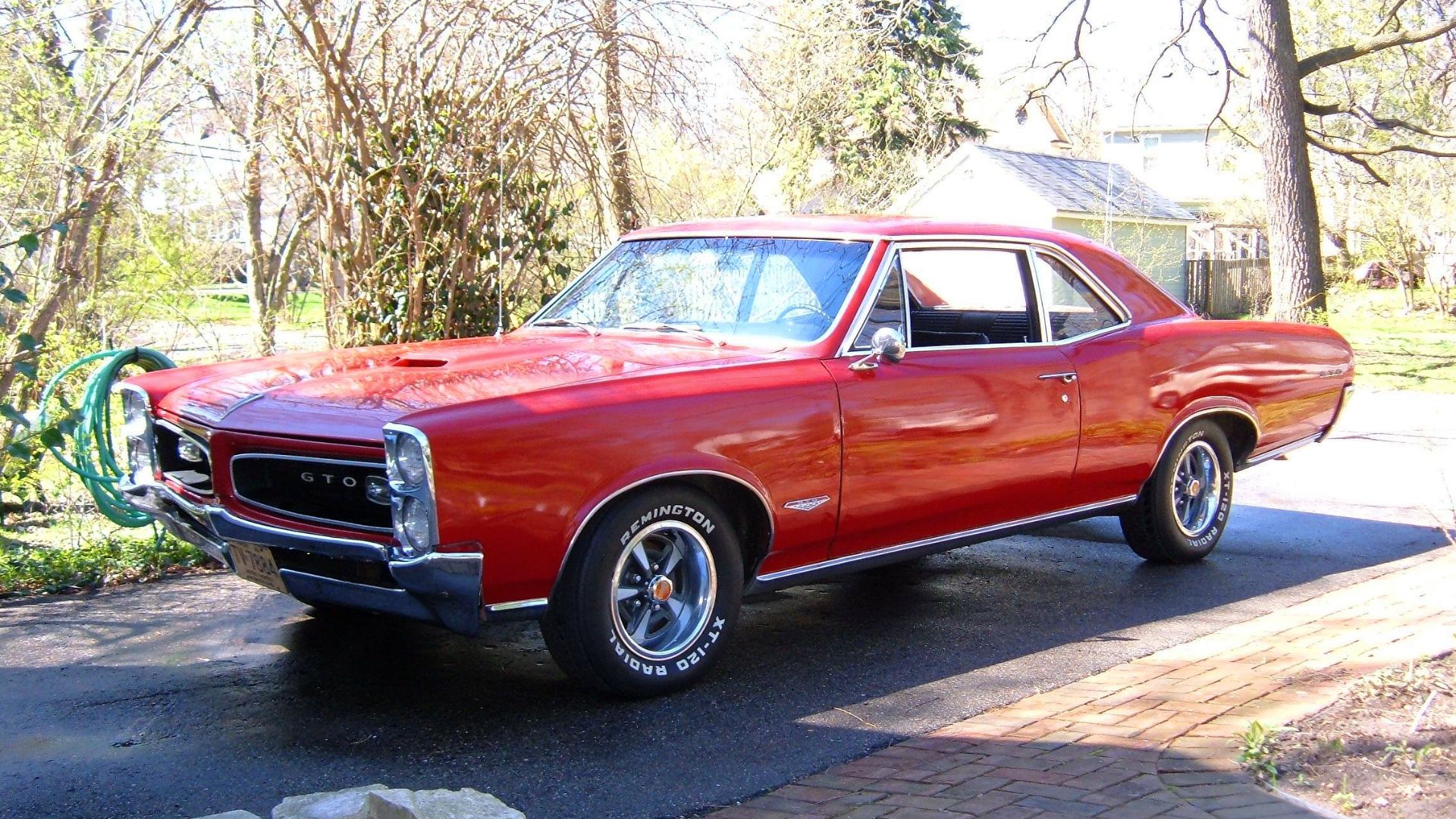 1966 Pontiac GTO coupe owned by Karl S. Freese seen with 1967 Ralley II wheels.