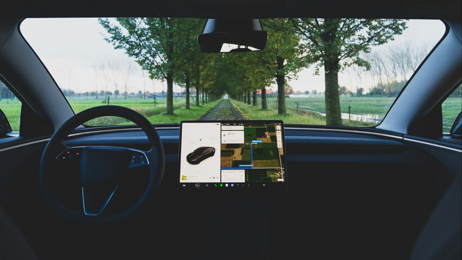 a view of a car from inside the car