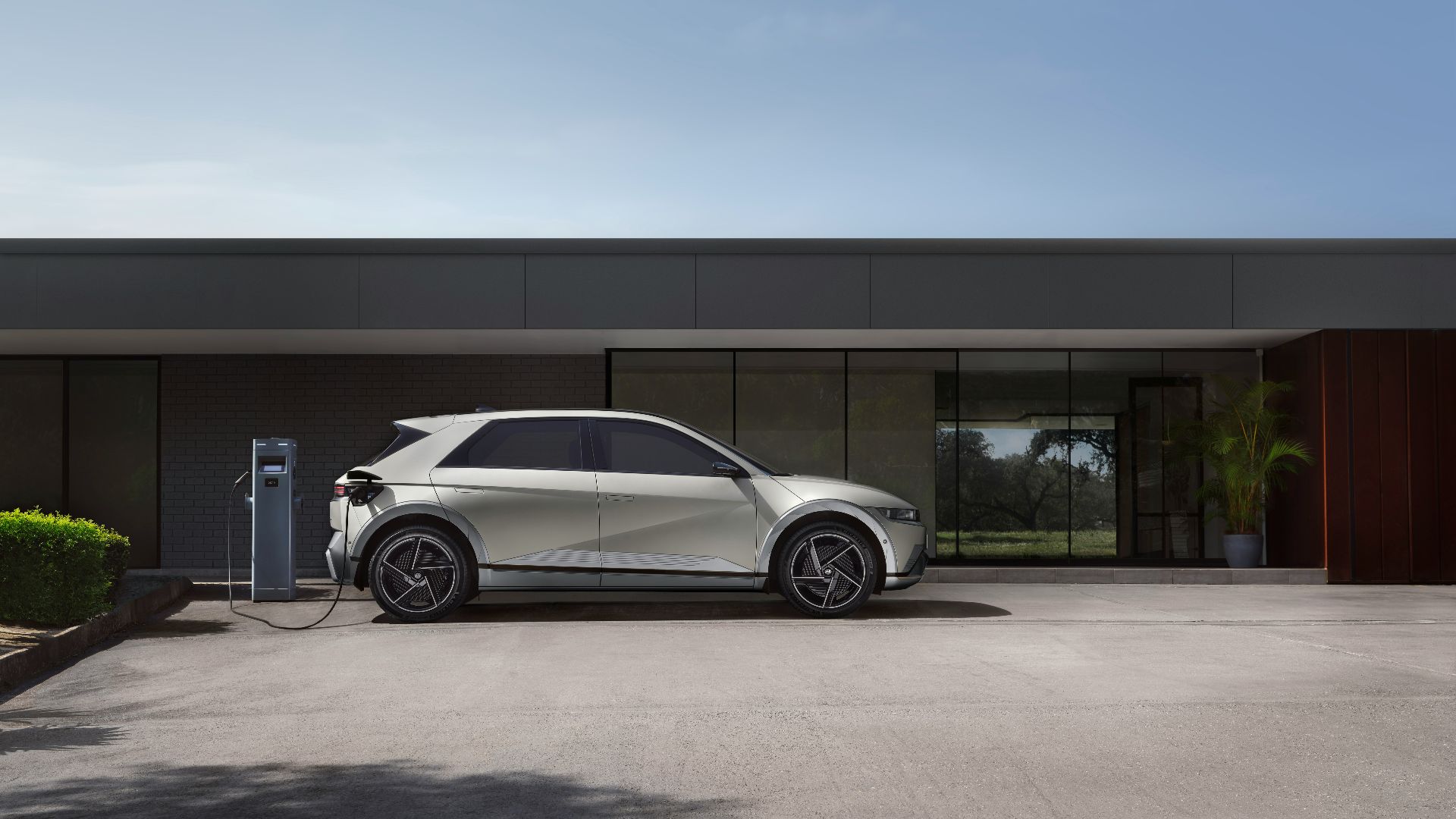 a white car parked in front of a building