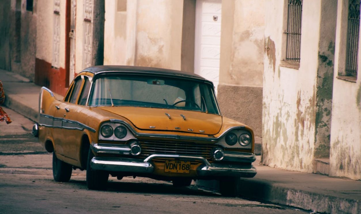 An Old Car on a Street