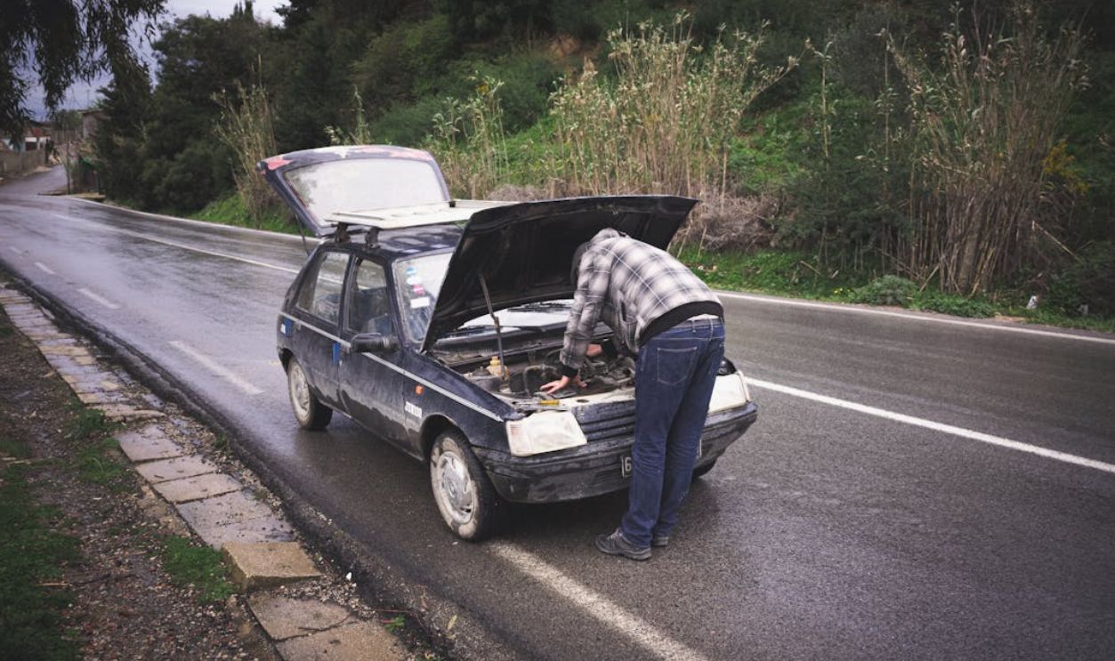 Man fixing a car