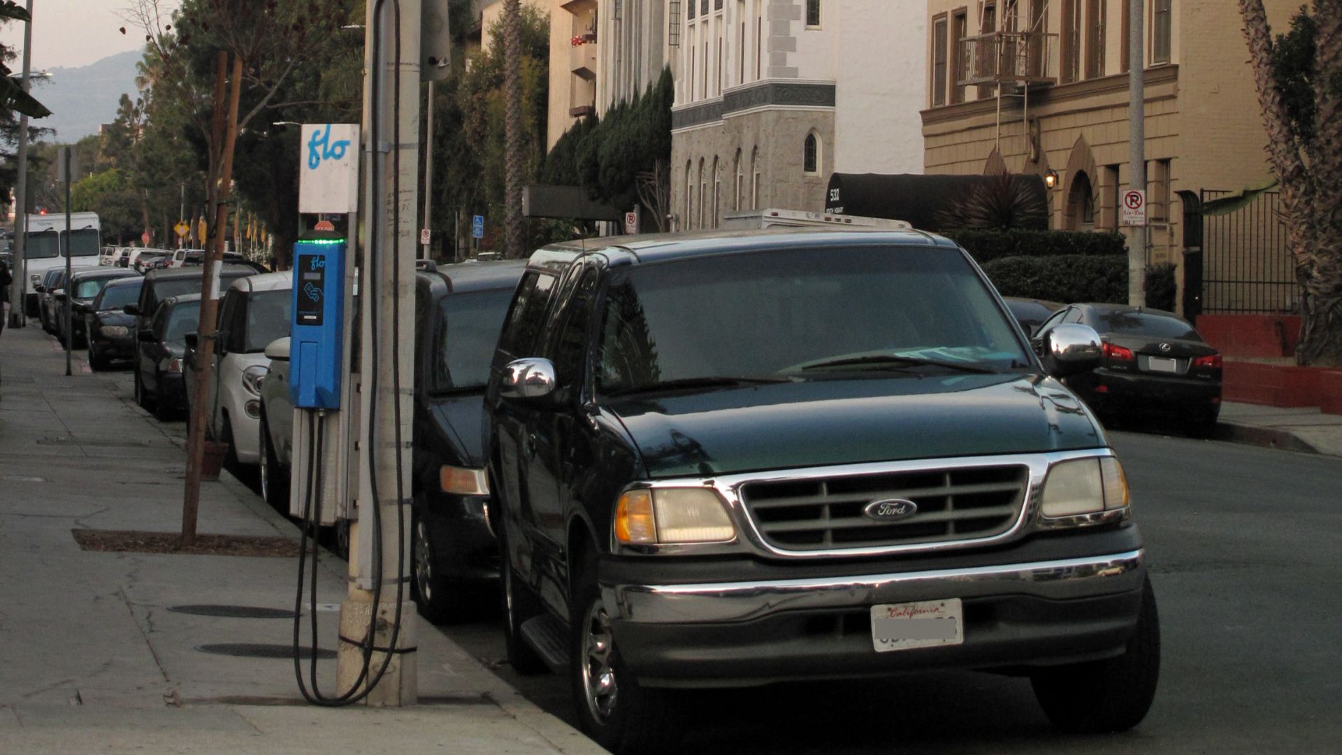 Electric vehicle (EV) charging station on Hobart Avenue, a side street in Koreatown, Los Angeles