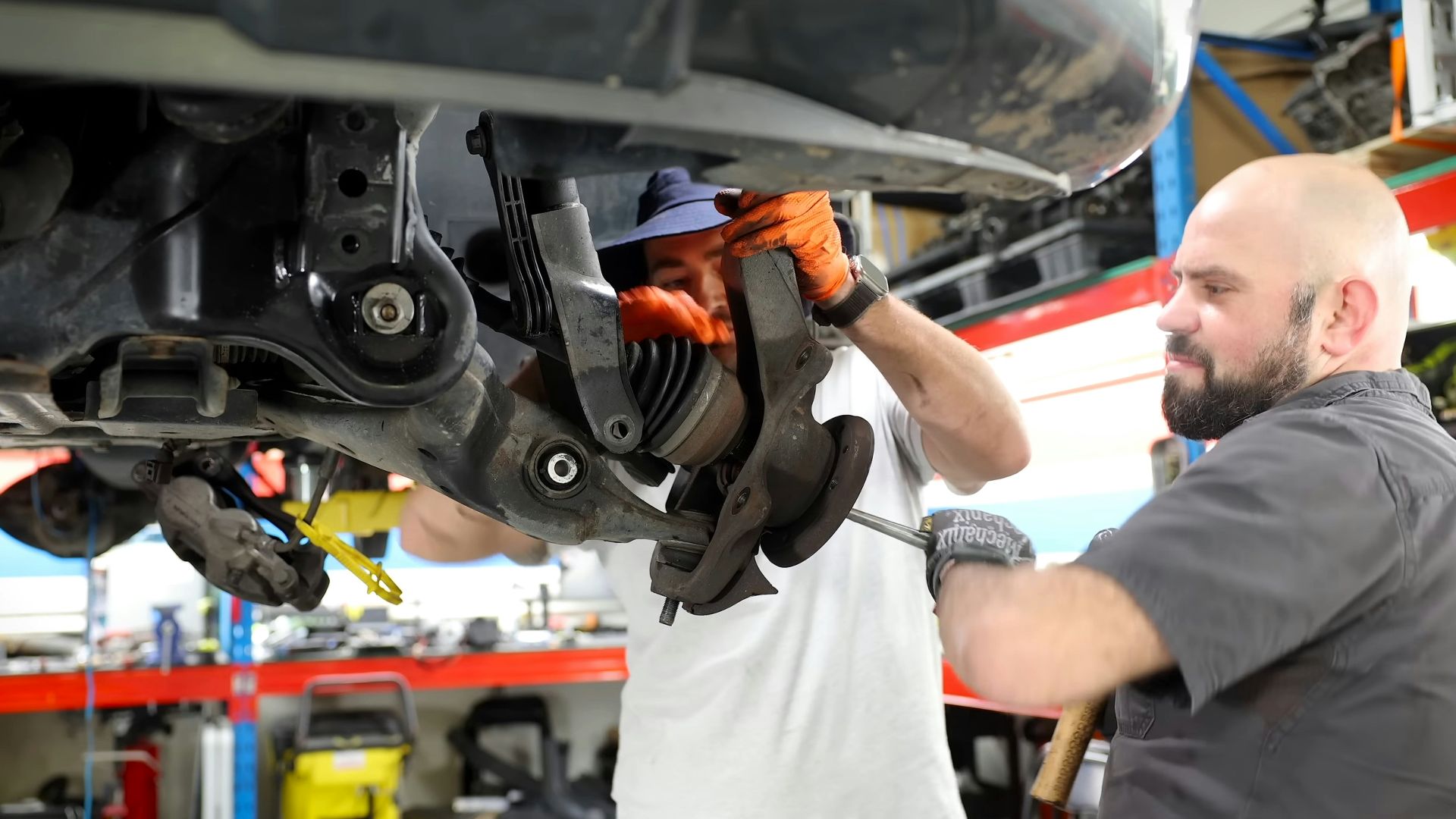 A man working on a car in a garage