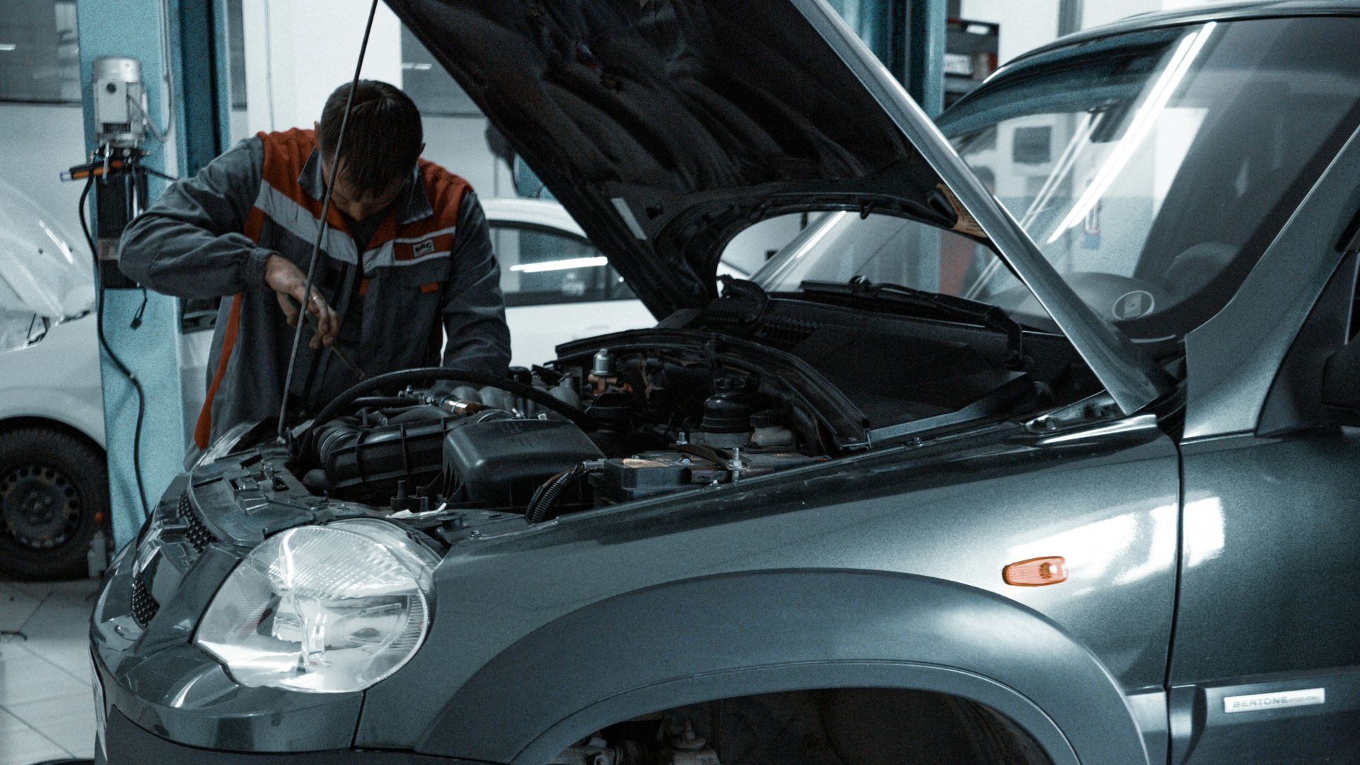 black suv in a garage