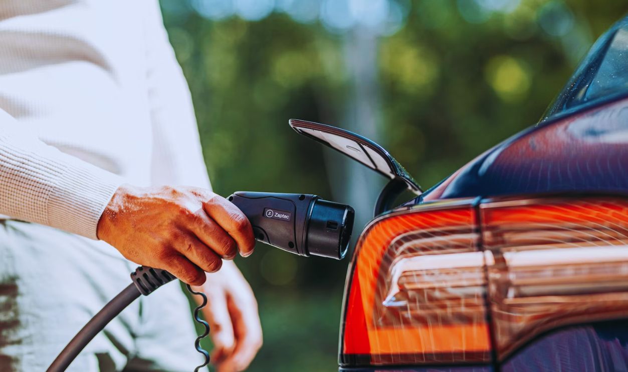 A man with EV charger
