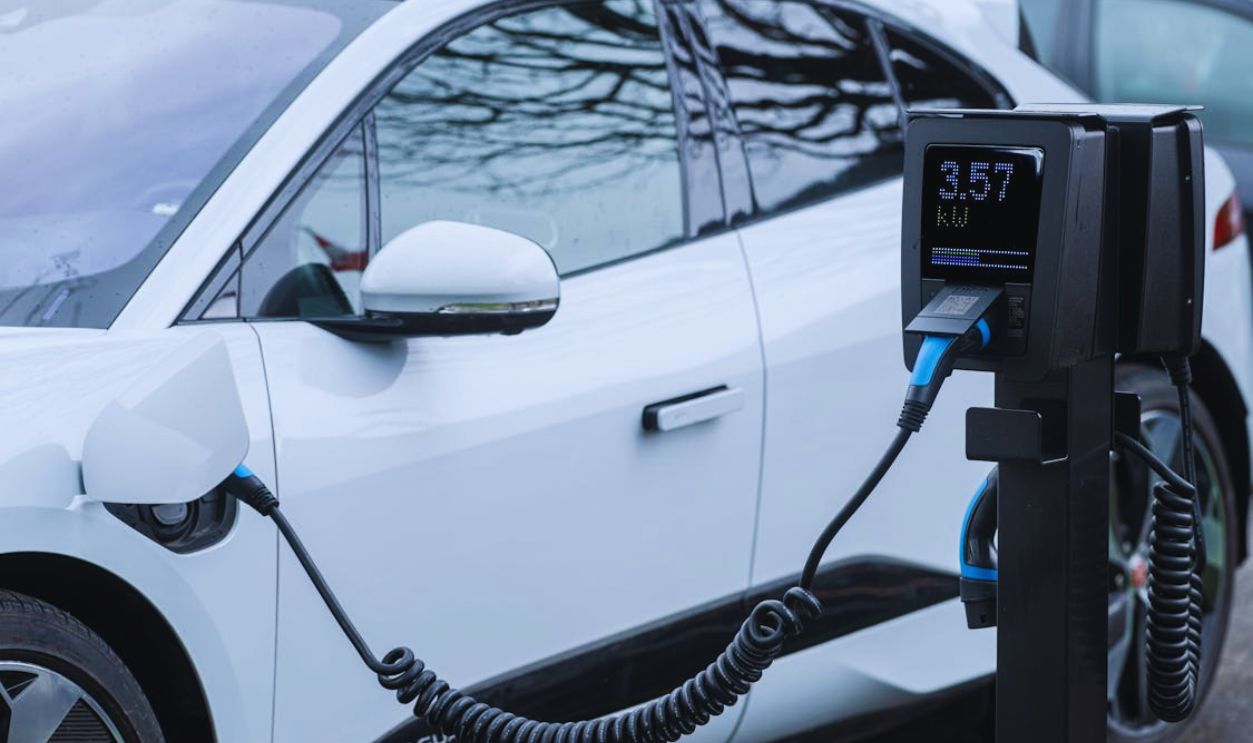 Electric Car Charging at Station with Display