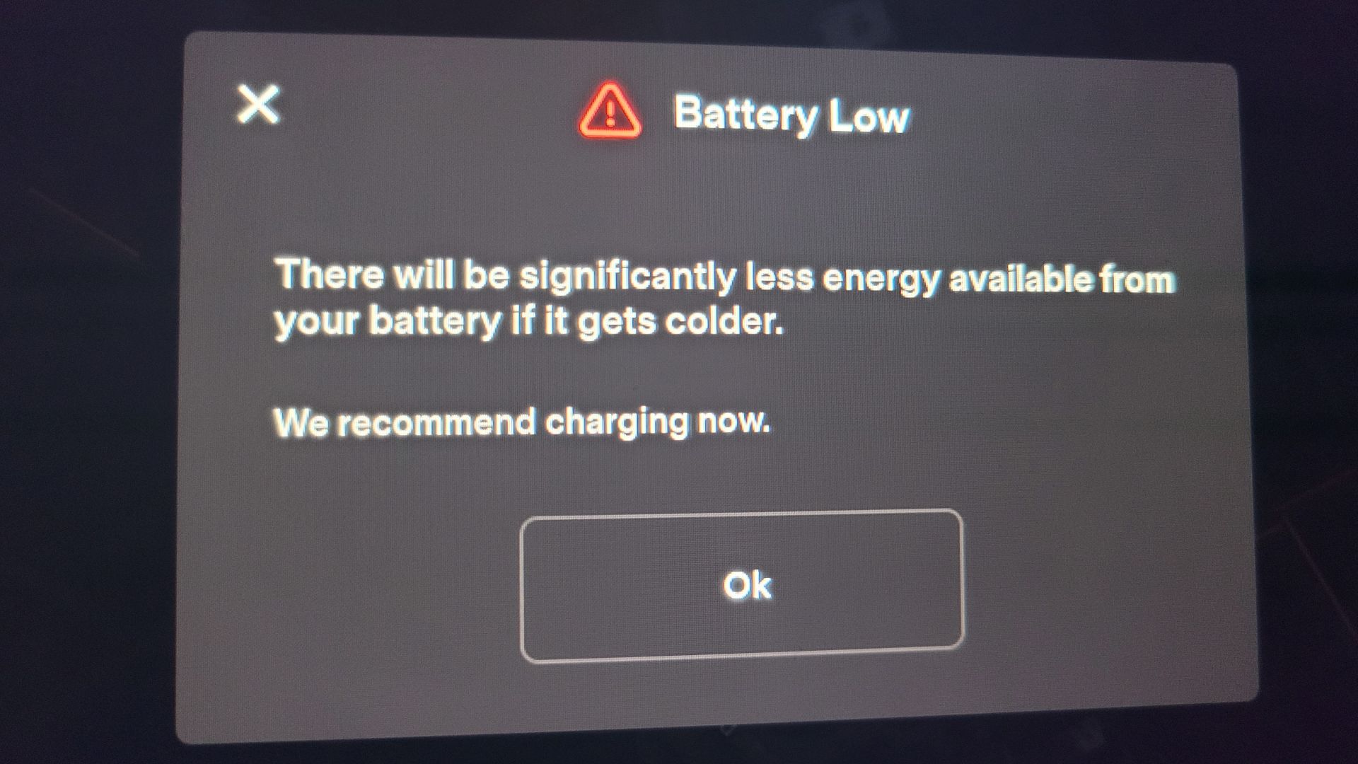 Warning that pops up on screen when Tesla battery is low. Roughly appears at 15%.