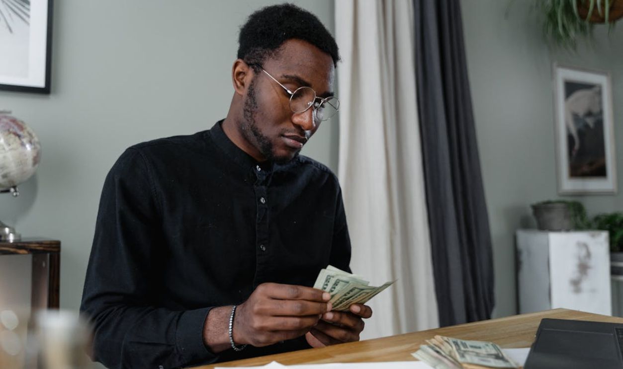 A Man Counting Money