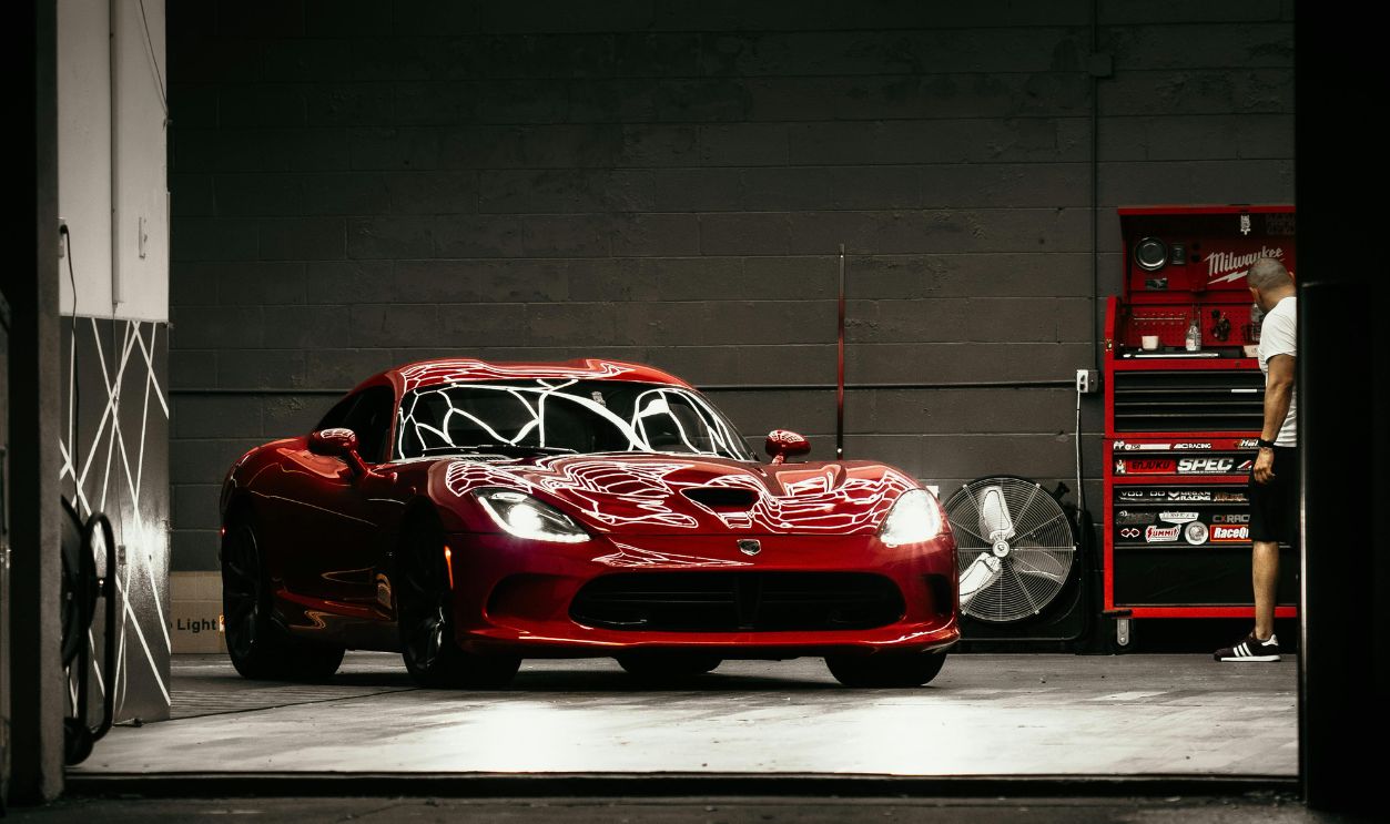 Red Ferrari 458 Italia Parked in Garage