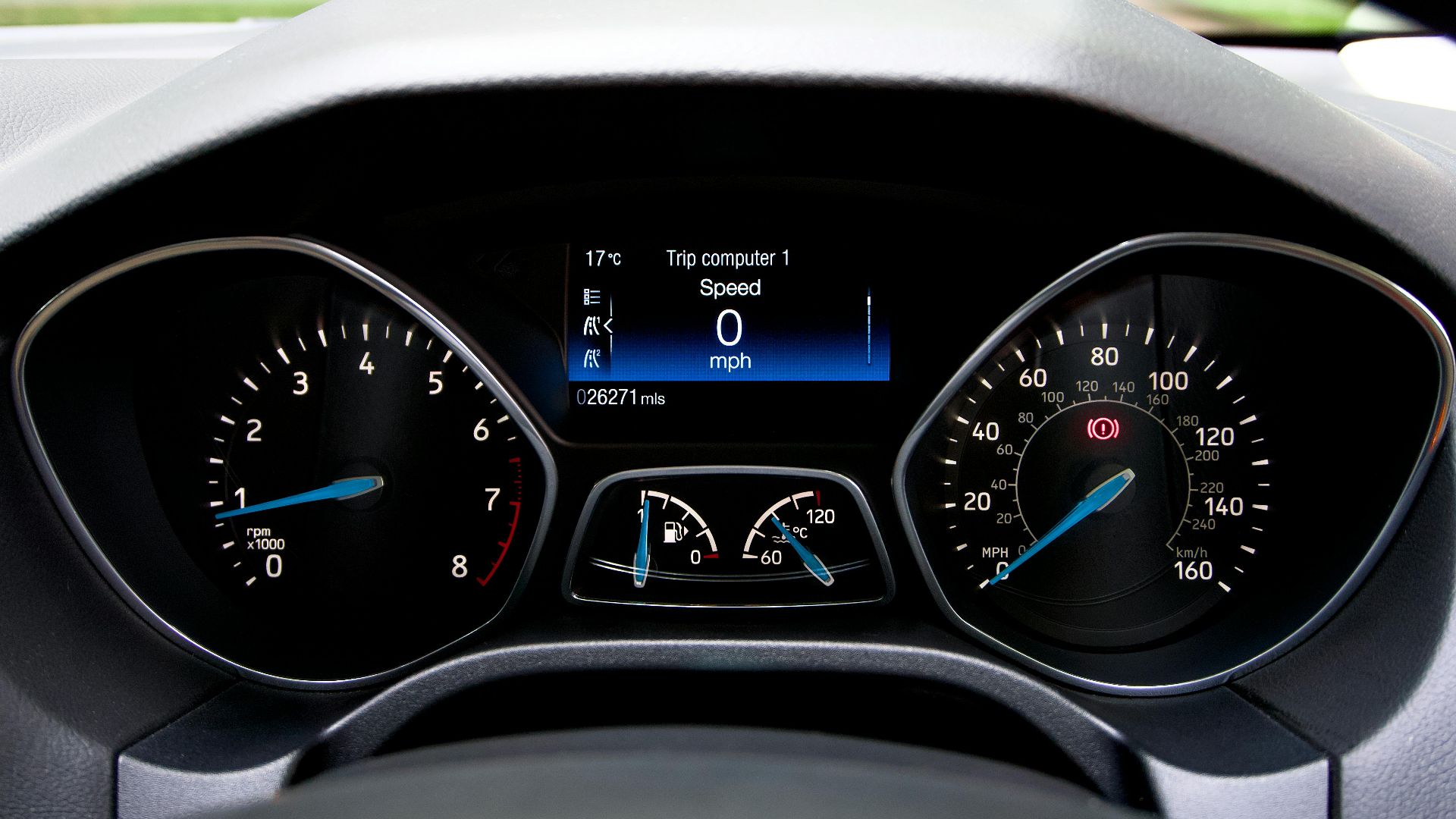 Close-up view of a Ford Focus dashboard showing the speedometer and various gauges.