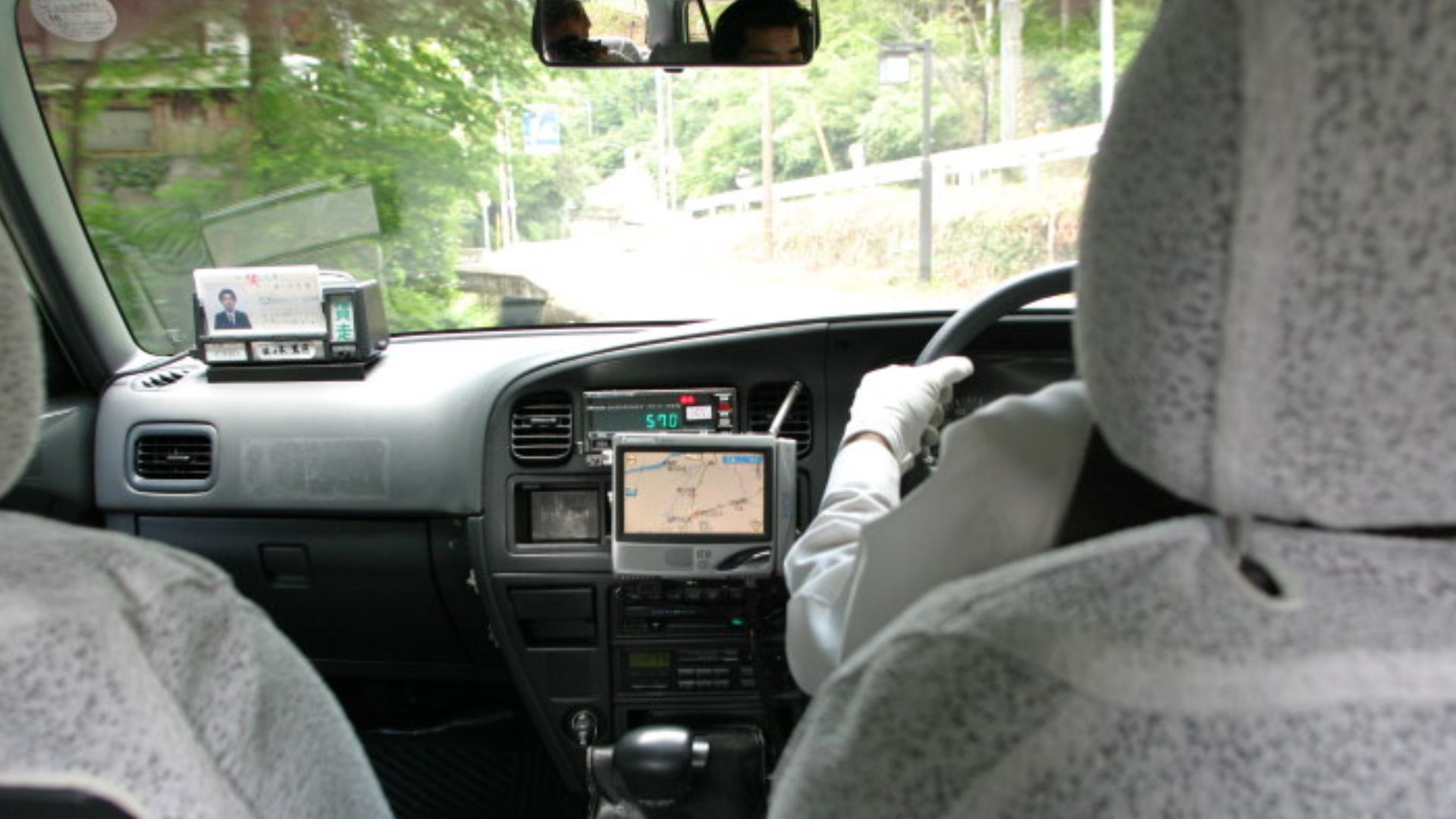 Taxi ride through Kyoto, GPS navigation system installed.